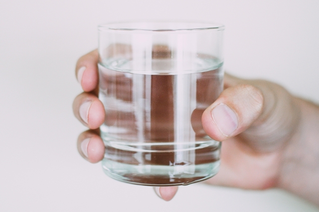 person-holding-drinking-glass-1346155